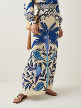 Falda acampanada con diseño único de flores de palmera